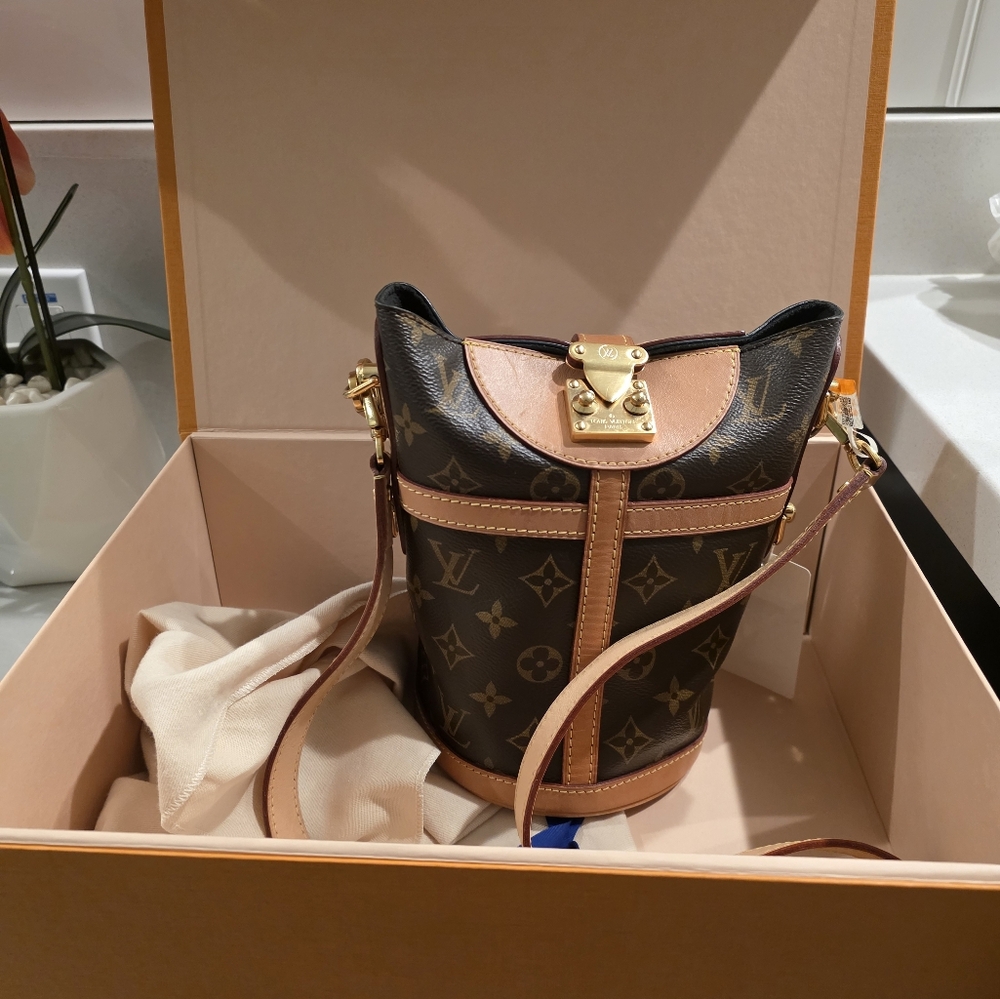  Louis Vuitton Monogram Canvas Duffle Bucket Bag with vachetta leather trim.